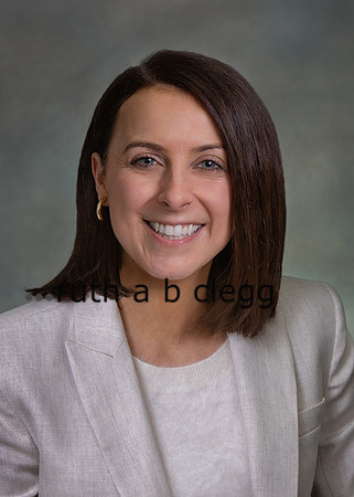 Professional portrait by Ruth A. B. Clegg, designed for clear and credible public identity.